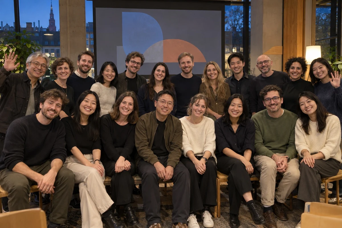 Members of a community meet-up posing for a group photo